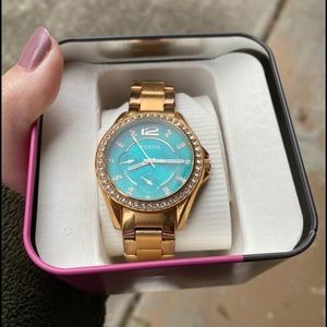Women’s gold and turquoise fossil watch